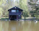 Cottage on the shores of Lake Hjlm...
