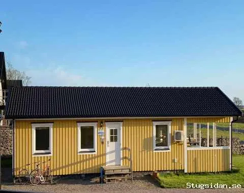 Stuga med havsutsikt närta golfbana