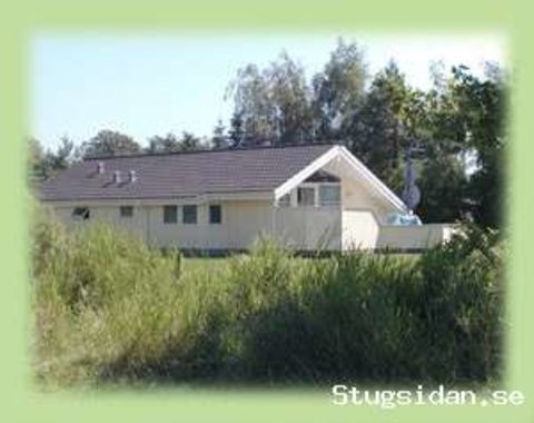 Feriehus med spa og sauna nær dejlig sandstrand