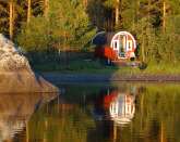 Unique lakeside sleeping barrel with SAUNA, CANOE, FIREPLACE