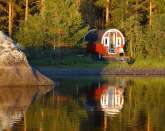 Unique lakeside sleeping barrel with SAUNA, CANOE, FIREPLACE