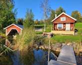 Timbercottage with sauna at the lak...
