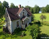 Lovely cottages by lake with boat and sauna